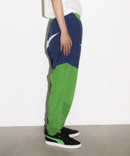 Load image into Gallery viewer, SLASH PANELED NYLON PANTS

